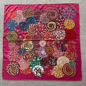 100%Silk scarf made in France 🇫🇷 pink background with multi colored pinwheels.